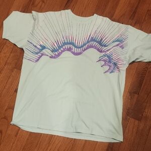 Vintage Graphic Tee with Purple and Pink Design